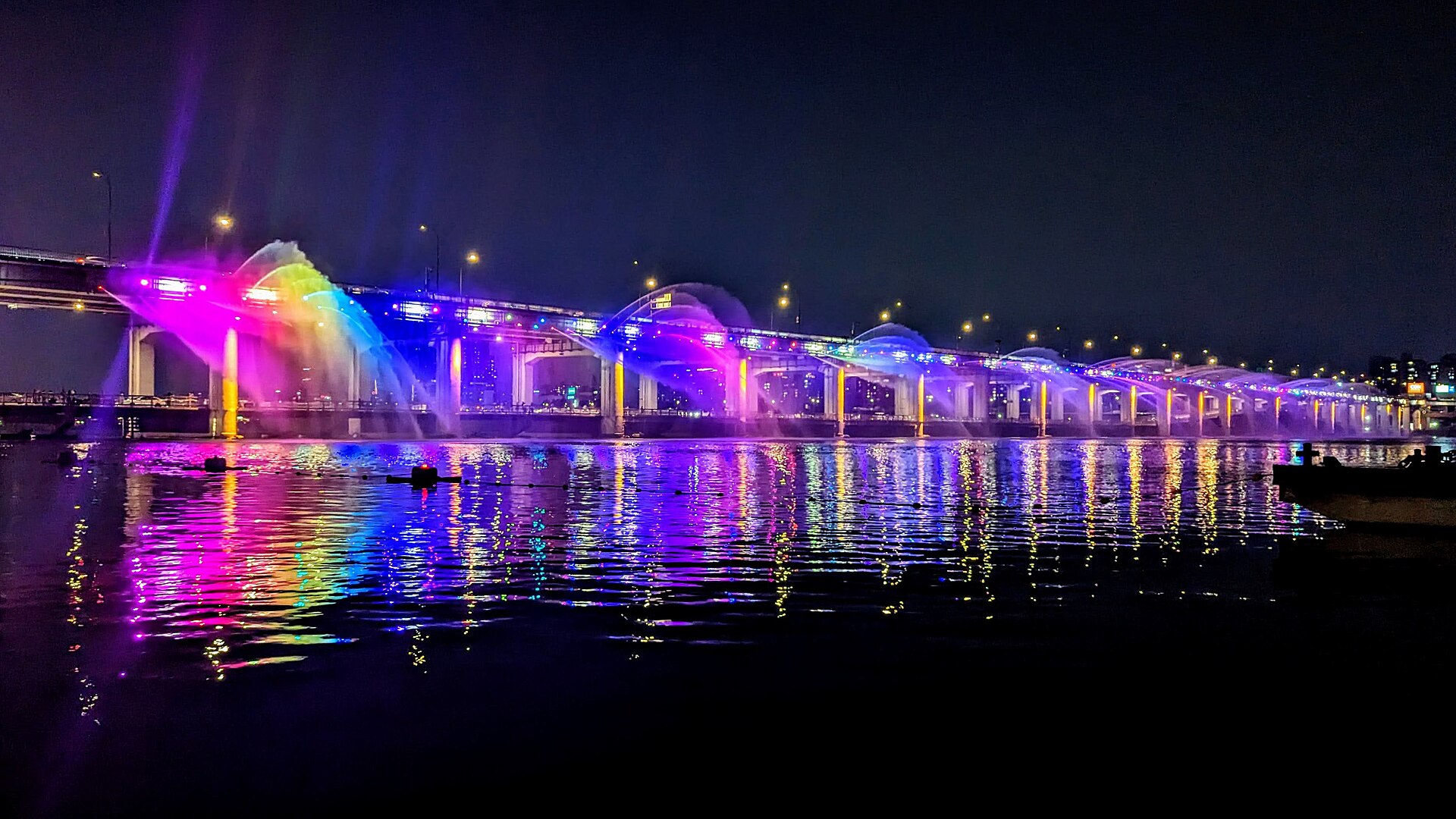 Banpo Bridge and Han River fountain at night in Seoul, independent destination photograph